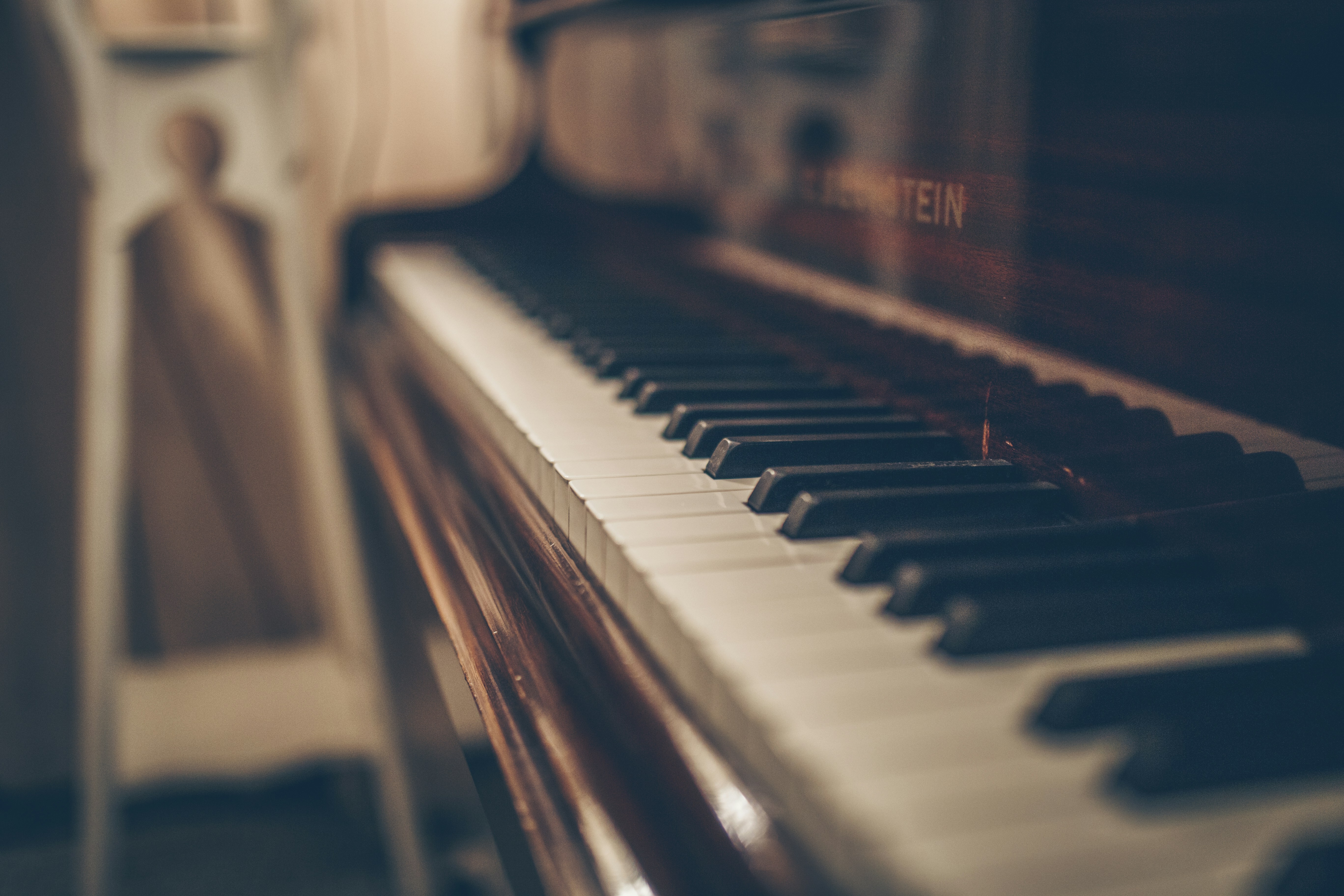 Sheet music resting on a piano stand.